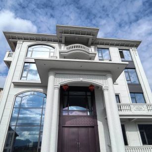 白银白麻别墅外墙干挂石材效果示例