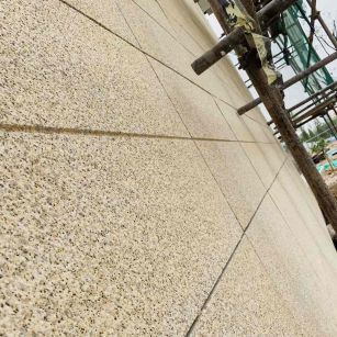 白银 黄金麻花岗岩荔枝面外墙干挂石材效果示例