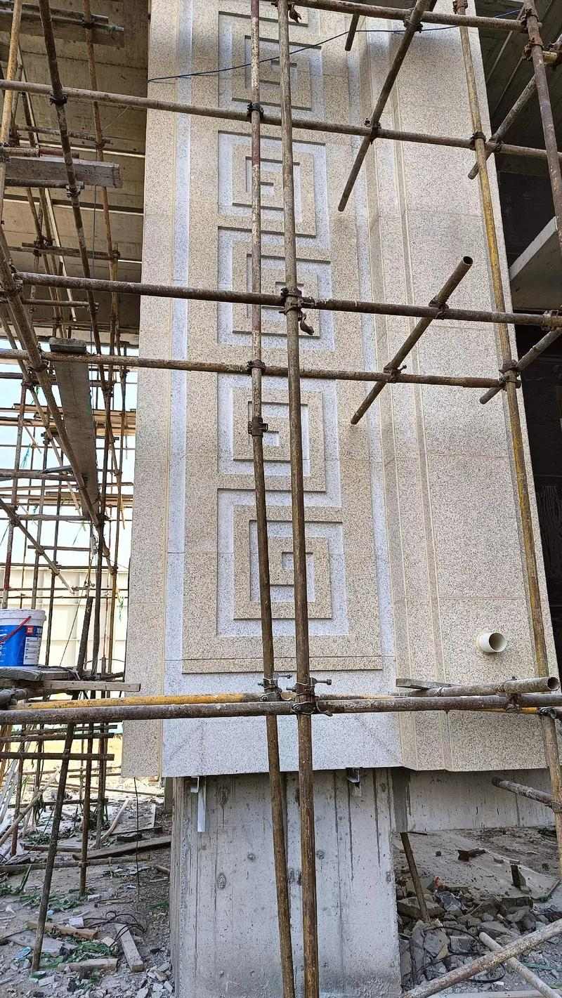 白银 黄金麻花岗岩别墅外墙干挂回纹造型效果